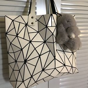 Rhombus with lattice folding shoulder bag